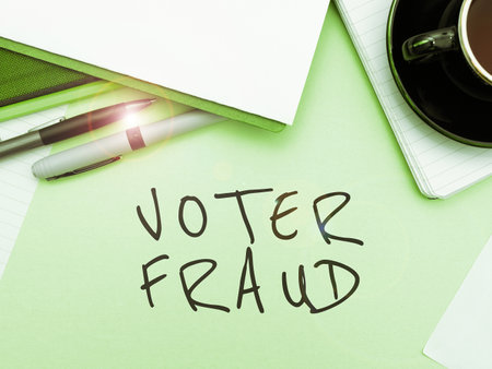 Sign displaying Voter Fraud. Word for formal indication choice between two or more candidates actionsの写真素材