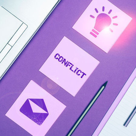 Text sign showing Conflict. Concept meaning disagreeing with someone about goals or targetsの写真素材