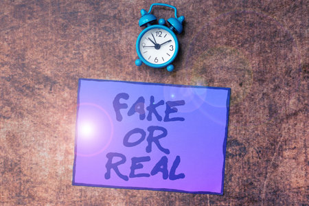 Conceptual caption Fake Or Real. Word Written on difference between facts and deliberate disinformationの写真素材