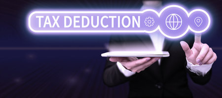 Conceptual caption Tax Deduction. Word Written on amount subtracted from income before calculating tax oweの写真素材