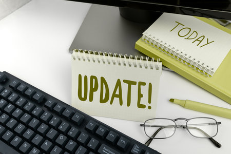 Text sign showing Update. Business approach Make something more modern Adding new facts Changing its designの写真素材