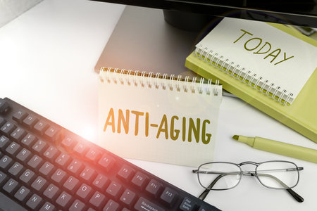 Text sign showing Anti Aging. Business approach A product designed to prevent the appearance of getting olderの写真素材