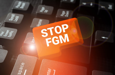 Hand writing sign Stop Fgm. Conceptual photo Put an end on female genital cutting and female circumcisionの写真素材