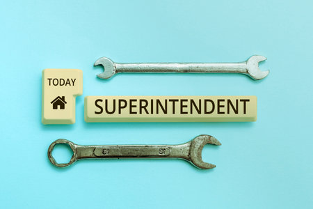 Handwriting text Superintendent. Word Written on a person who manages organization or activity of particular processの写真素材
