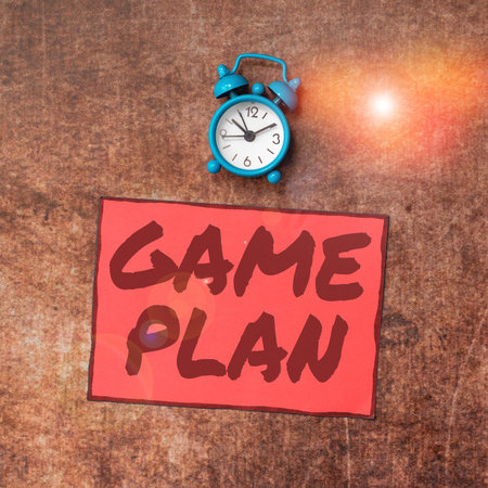 Conceptual caption Game Plan. Business concept strategy worked out in advance in sport politics or businessの写真素材