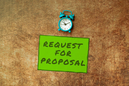 Sign displaying Request For Proposal. Word for document contains bidding process by agency or companyの写真素材