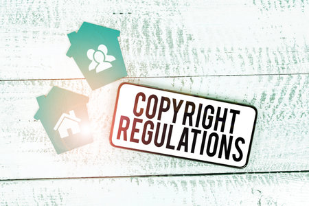 Handwriting text Copyright Regulations. Business approach body of law that governs the original works of authorshipの写真素材
