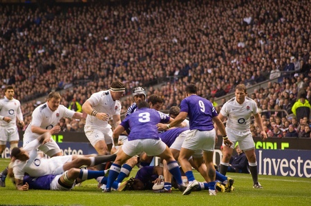 TWICKENHAM LONDON - NOVEMBER 20: English Ruck at England vs Samoa, England playing in white Win 26-13, at Investec Rugby Match on November 20, 2010 in Twickenham, England. のeditorial素材