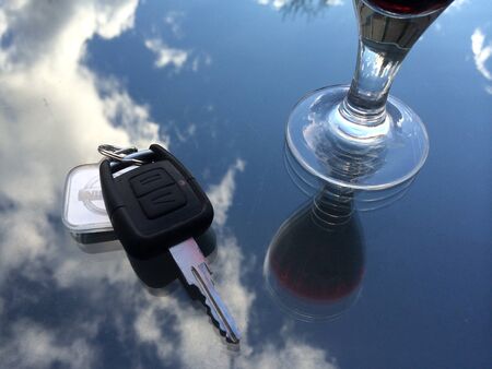 car keyes and glass of wineのeditorial素材