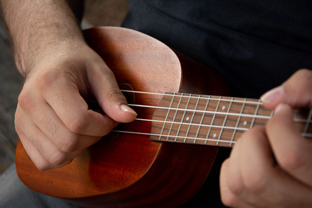 man playing the ukuleleの写真素材