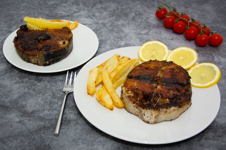 Grilled tuna with lemon and potatoes, healthy foodの写真素材