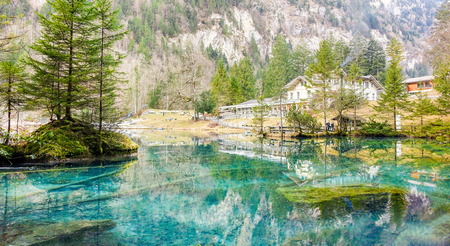 BLAUSEE KANDERGRUND, SWITZERLAND - DECEMBER 18, 2016:Blue Lake nature park in winter Kandersteg, Switzerland.Paradise mountain landscape for tourist and traveler.のeditorial素材