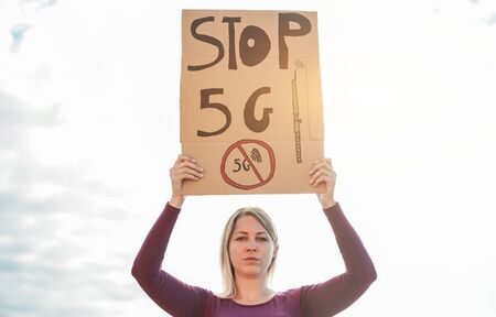 Young woman protest against 5g and cell towers - Electromagnetic pollution and internet of things...