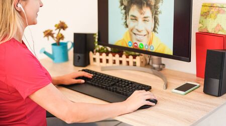 Happy multiracial friends doing video call during isoalation quarantine lockdown - Young people...