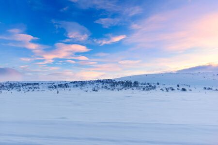 Arctic Road Trip in Russia's far North above the Arctic Circle: the snowy landscape of Kola...