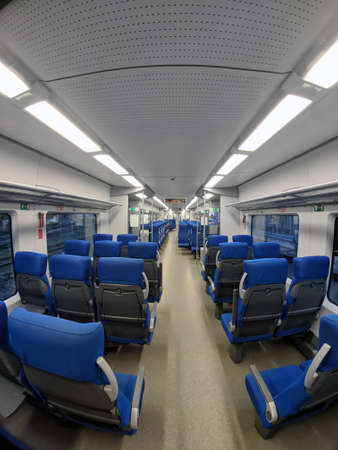 Tver, Russia - 06 07 2018: Interior of empty passenger carriage in the new Russian rapid transport train Lastochka - Verticalのeditorial素材