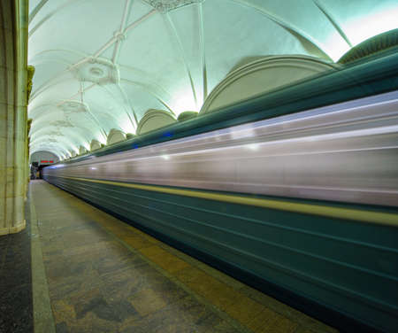 Moscow, Russia - 01 07 2015: a Moscow Metro train speeds away from the underground station (with...