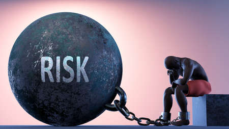 Risk as a heavy weight in life - symbolized by a person in chains attached to a prisoner ball to show that Risk can be a sorrow, brings suffering and it is a psychological burden, 3d illustrationの写真素材