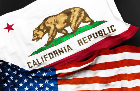 Flag of California along with a flag of the United States of America as a symbol of unity between...