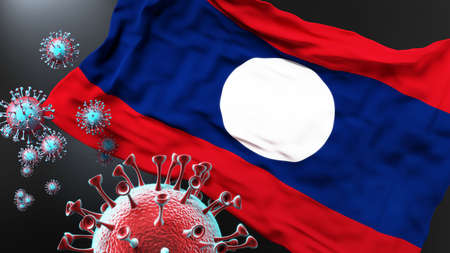 Lao Peoples Democratic Republic and the covid pandemic - corona virus attacking its national flag to symbolize fight with the virus in this country, 3d illustrationの写真素材