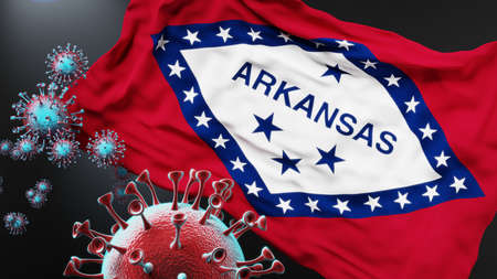 Arkansas and covid pandemic - virus attacking a state flag of Arkansas as a symbol of a fight and struggle with the virus pandemic in this state, 3d illustrationの写真素材