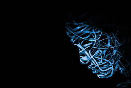 abstract face with a tangle of lines making up the outlineの写真素材