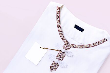 Button knot chinese : price tag on clothes white  (with clipping path)の写真素材
