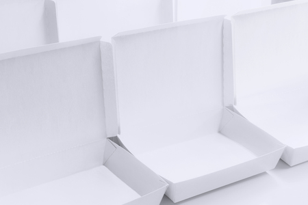 Blank paper package white box for food products on the white background.
