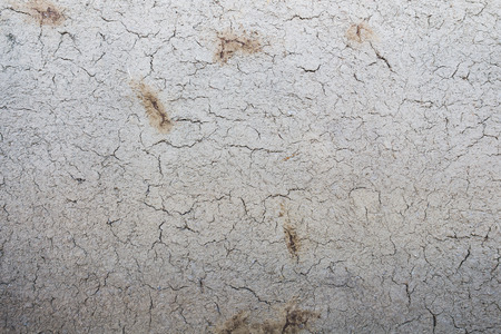 Earth house texture soil wall of traditional house made of clay and straw.の写真素材