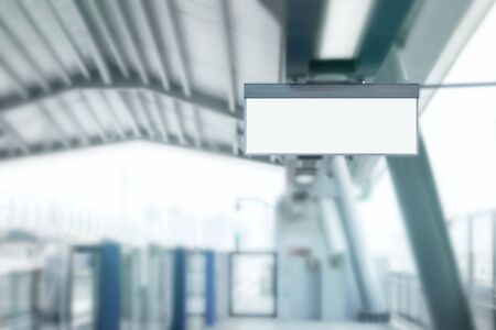 Blank signboard and billboard displaying advertisements in subway train station. It is direction signage mock up for information public travel and transportation.の写真素材