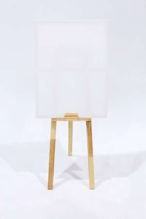Canvas frame blank for mockup on wooden easel. Creative for paint drawing of artist concept. With clipping path.の写真素材