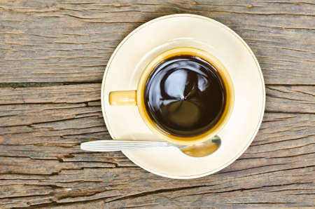 Coffee on old wooden table.の写真素材