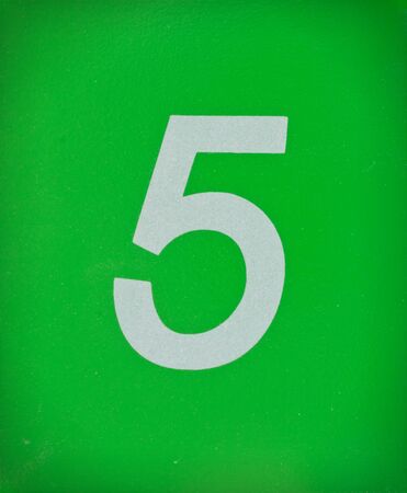 White number 5 on green background の写真素材