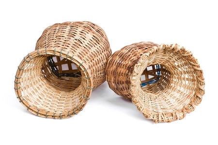 Woven bamboo container on a white background の写真素材