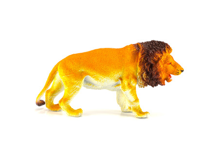 Lion toy isolated on whiteの写真素材