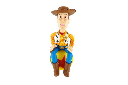 Bangkok,Thailand - February 08, 2015: Sherrif Woody toy on red star ball a fictional character in the Toy Story franchine. This figure by disney Pixar.のeditorial素材
