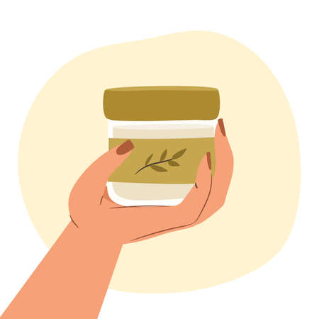 Woman hand showing a skincare product. Closeup of girl hand holding cosmetic product.のイラスト素材