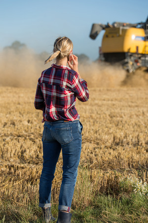 female farmer using electronicsの写真素材