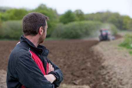 farmer showing new tractor