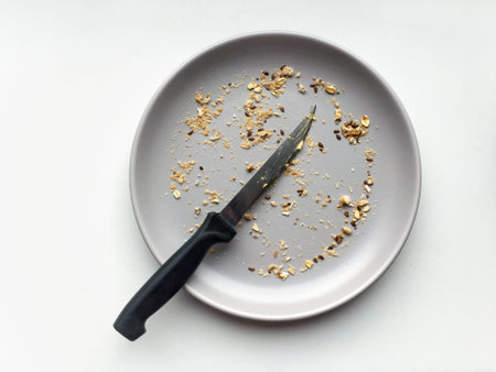 Crumbles on a plate with a knife