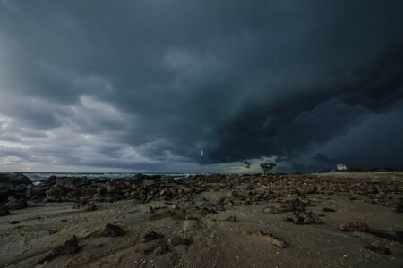 Rain is falling into the seaの写真素材