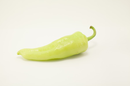 green chile on a white backgroundの写真素材