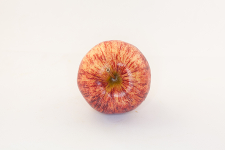 red apple on a white backgroundの写真素材