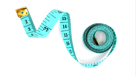 Top view Green tape measure isolated on white background.の写真素材