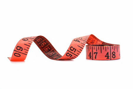 Red tape measure isolated on white background.の写真素材