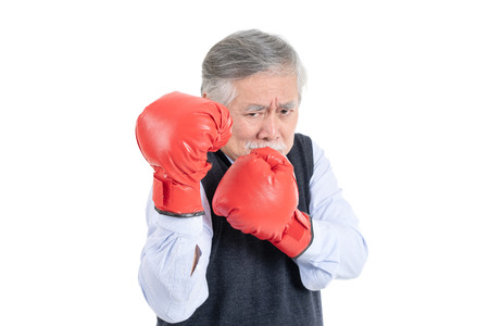 fighter asian senior old man sport boxing red gloves copy space for your advertisement or promotional text on isolated white background.の写真素材