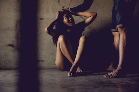 criminal tying hands with handcuffs.の写真素材