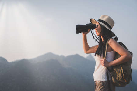 Hiker woman attractive traveler adventure wilderness.の写真素材