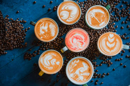 coffee latte art on wood table, relax time, cafe barista art top view.の写真素材