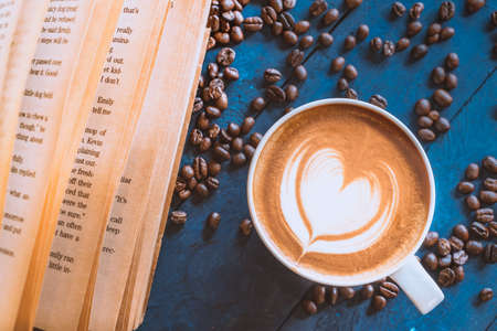 coffee latte art on wood table, relax time, cafe barista art top view.の写真素材